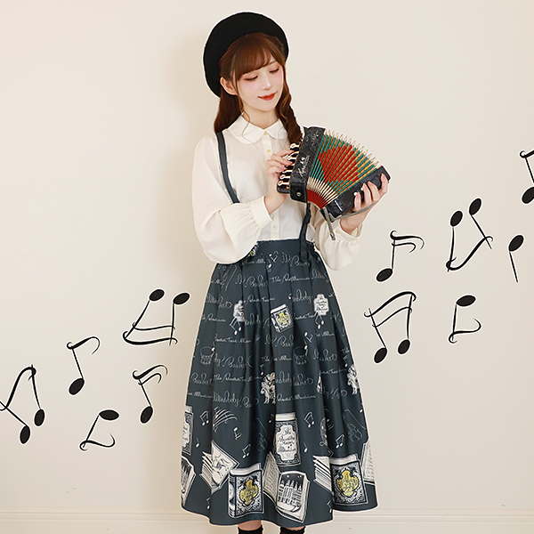 ロゴ刺繍リボンタイブラウス