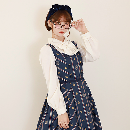 ロゴ刺繍リボンタイブラウス