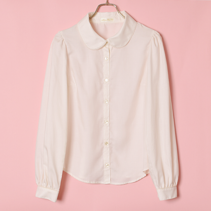 ロゴ刺繍リボンタイブラウス